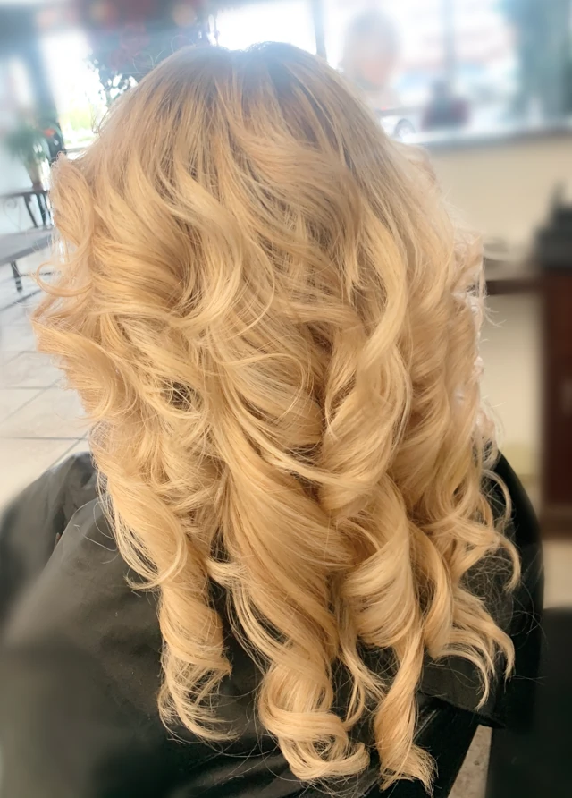 Golden blonde curls viewed from behind